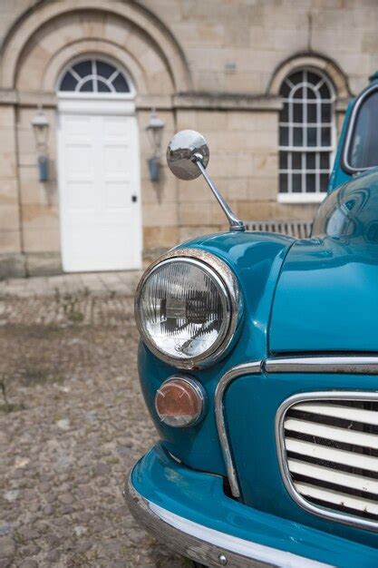 Premium Photo A Classic Duck Egg Blue Vintage Morris Minor Car In