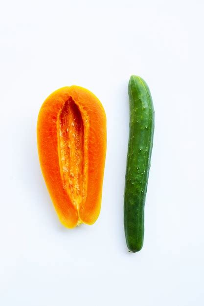 Premium Photo Cucumber And Papaya On White Background Sex Concept