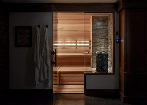 Custom Finnleo Sauna With Himalaya Heater And Stone Wall Moderno