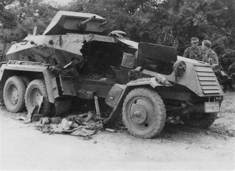 German Soldiers Contemplate A Wrecked Sdkfz 231 Armored Fighting