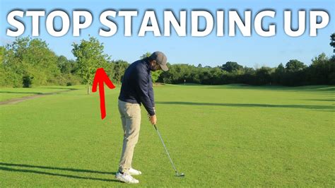 How To Stop Standing Up When Hitting The Golf Ball Youtube