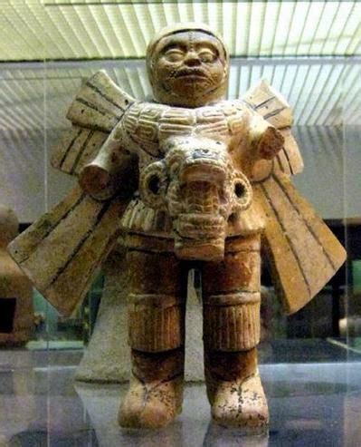 An Ancient Statue Is On Display In A Museum