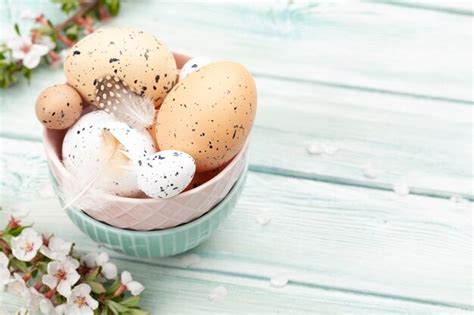 Premium Photo Easter Eggs And Cherry Blossom