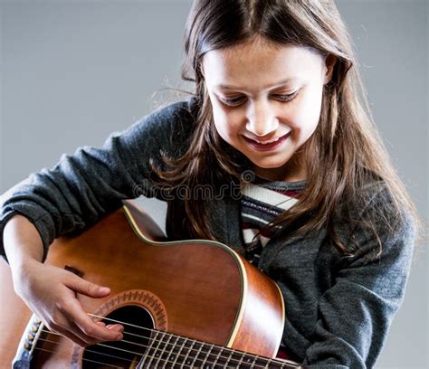 Smiling Girl Playing Classic Acoustic Guitar Stock Photo - Image of ...