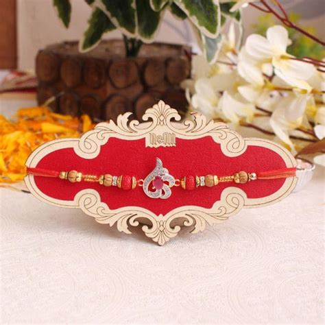 Send Designer Ad Stone Rakhi Online