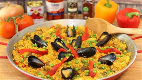 Como Hacer Paella Mixta Mariscos Y Carnes Youtube