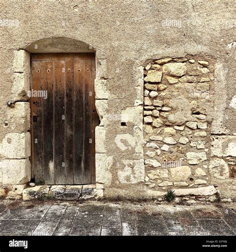 Old Wooden Door And Older Blocked Doorway Le Blanc Indre France