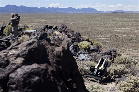 Marine Corps Lance Cpl Patrick W Mendoza Uses Binoculars To Scan The