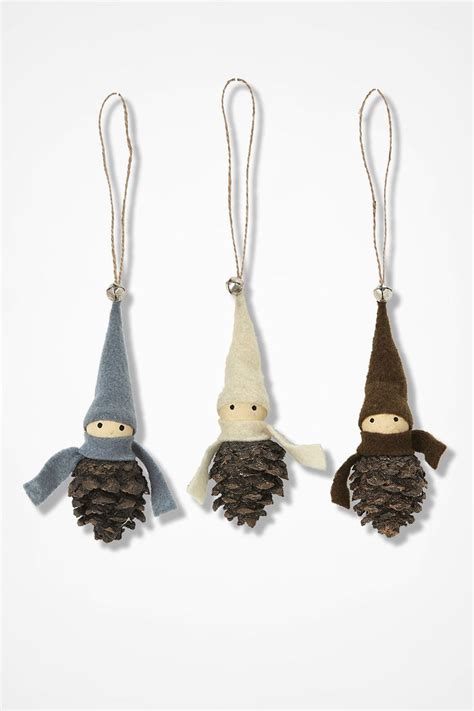 Three Christmas Ornaments Made From Pine Cones One With A Gnome And