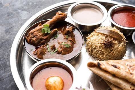 Premium Photo Kolhapuri Chicken Thali Is A Popular Indian Asian Food