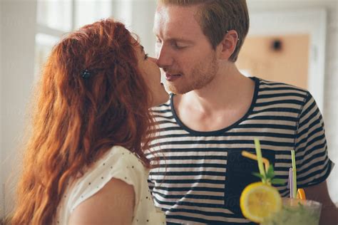 Ginger Couple Kissing By Stocksy Contributor Lumina Stocksy