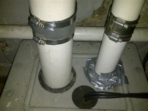 Sewer ejector pump venting in basement bathroom