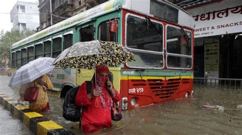 Photos Heavy Rain Halts Mumbai Offices Shut Trains Stopped