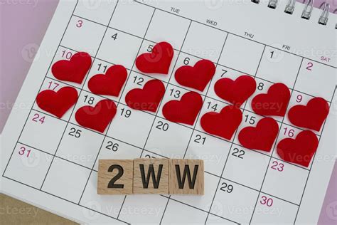 ww word  wooden block  red heart shape  calendar  week