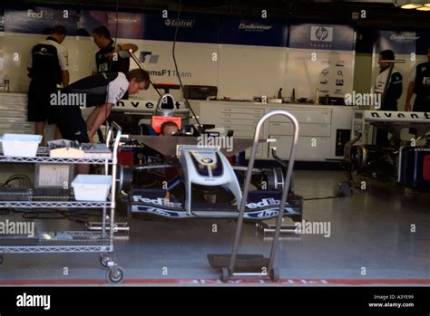 Formula 1 Racing Car Pit Lane Inside Garage Mechanics Working Gilles