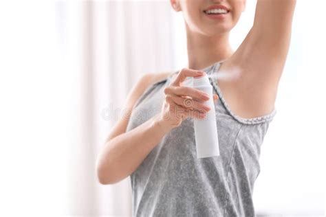 Beautiful Young Woman Applying Deodorant Stock Photo Image Of Hygiene