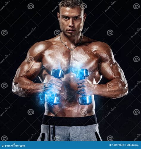 Muscular Fitness Sports Man Atlete With Dumbbell In Fitness Gym