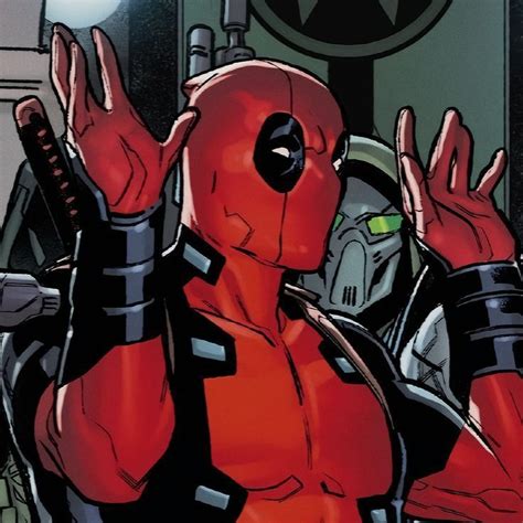 Deadpool Is Standing In Front Of A Star Wars Sign And Holding His Hands Up