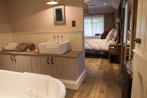 Cabin Interior at THE PIG, Brockenhurst Dark Grey Tile, Beige Stone, Pig Restaurant, The Pig ...