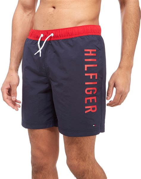 Lyst Tommy Hilfiger Logo Swim Shorts In Blue For Men