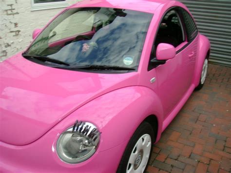 Pink Volkswagen Beetle Convertible With Eyelashes