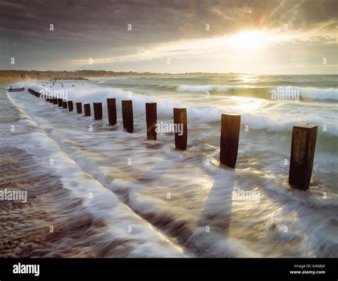 Wooden groynes groyne hi-res stock photography and images - Alamy