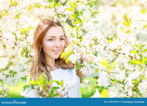 Portrait Of Beautiful Woman In Spring Flowers Stock Photo Image Of