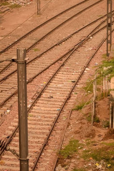 View Of Train Railway Tracks From The Middle During Daytime At