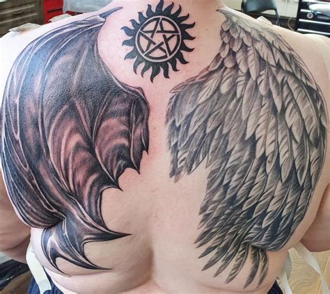 Fallen Angel Wings Tattoo