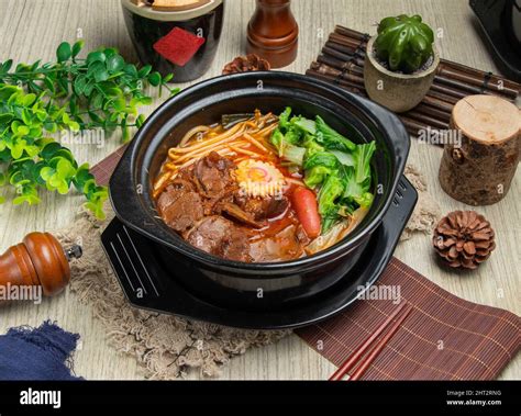 Spicy Braised Beef Tendon Casserole Rice Noodles Isolated On Mate Top