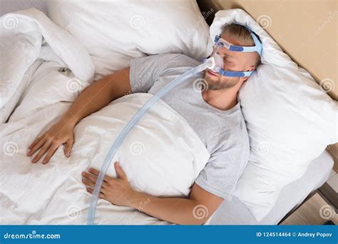 Man With Sleeping Apnea And Cpap Machine Royalty Free Stock Image 124514464