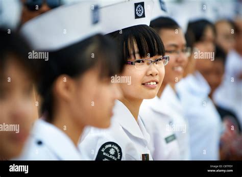 Young Female Nurses Representing St John Ambulance Of Malaysia Lined