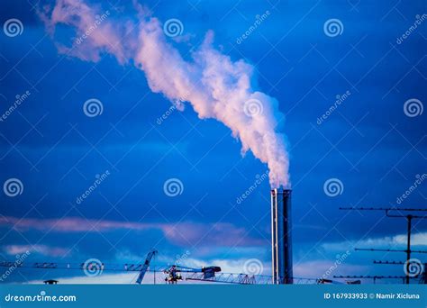 Atmospheric Air Pollution From Industrial Smoke Billowing From Smoking