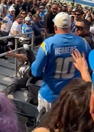 Raiders Fan Is Thrown Down Steps By A Chargers Rival As Nfl Suffers