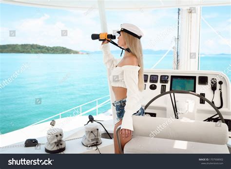 Sexy Blonde Girl Looking Through Binoculars Stock Photo Shutterstock