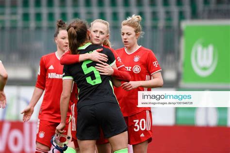 Lena Oberdorf VfL Wolfsburg Hugs Lea Schueller FC Bayern Muenchen GER