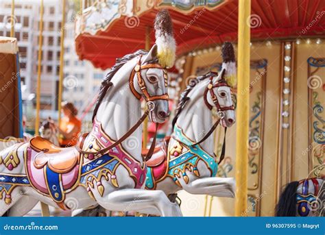 Horses On A Carnival Merry Go Round Old French Carousel In A Holiday