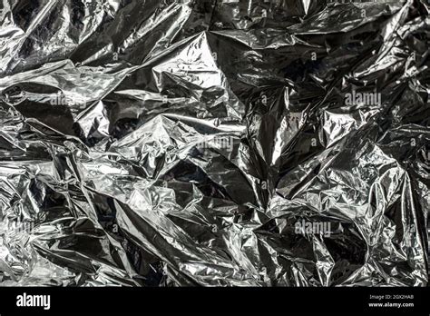 Close Up Of Aluminium Foil Crumpled Silver Foil Texture Background