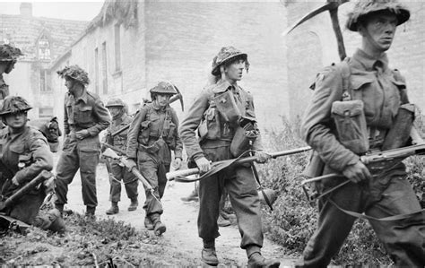 Infantry of 6th Royal Scots Fusiliers, 15th Scottish Division in the village of St Mauvieu ...