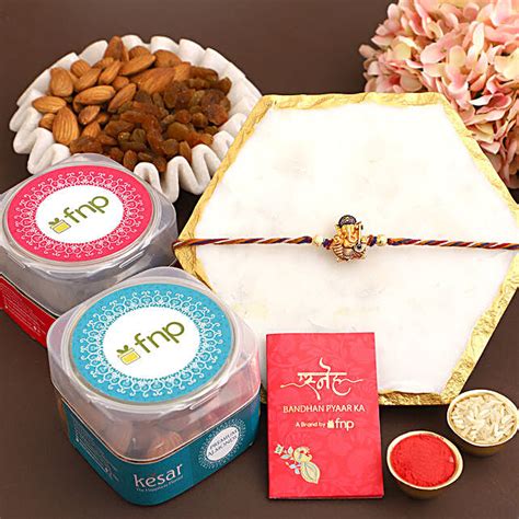 Buy Send Sneh Mukut Ganesha Rakhi N Kesar Dry Fruits Online Fnp