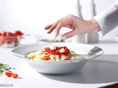 Woman Cooking Pasta Sauce Photos And Premium High Res Pictures Getty Images