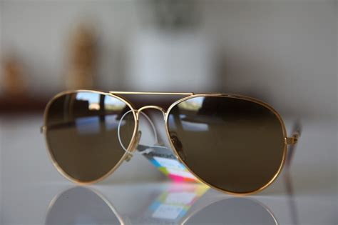 Gold Aviator Frame With Gold And Golden Brown Arms And With Golden Brown Lenses From Polaroid S