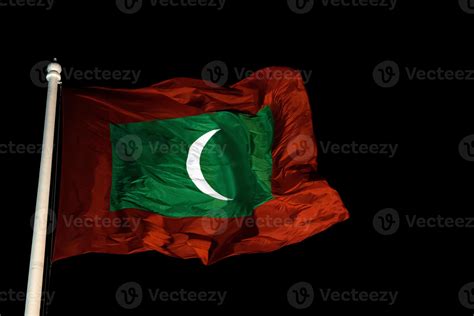 Maldives Flag While Weaving At Night Stock Photo At Vecteezy