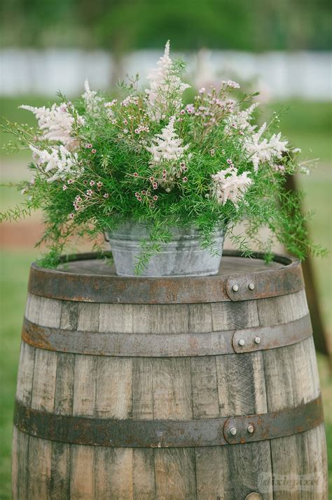 Whiskey barrel wedding arrangement - rustic wedding - farm wedding ...