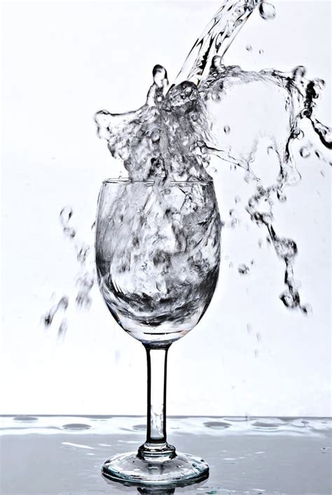 Water Splash Into A Glass Stock Image Image Of Closeup 25640271