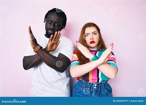 Interracial Couple Wearing Casual Clothes Rejection Expression Crossing