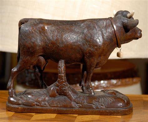 Carved Black Forest Cow On Base At 1stdibs