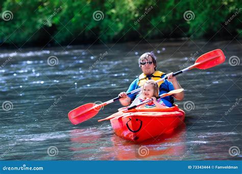 Father And Child Kayaking In Summer Stock Photo Image Of Parent