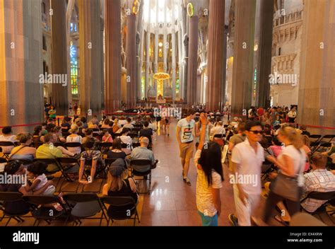 Tourists Inside The Sagrada Familia Cathedral Designed By Antoni Gaudi