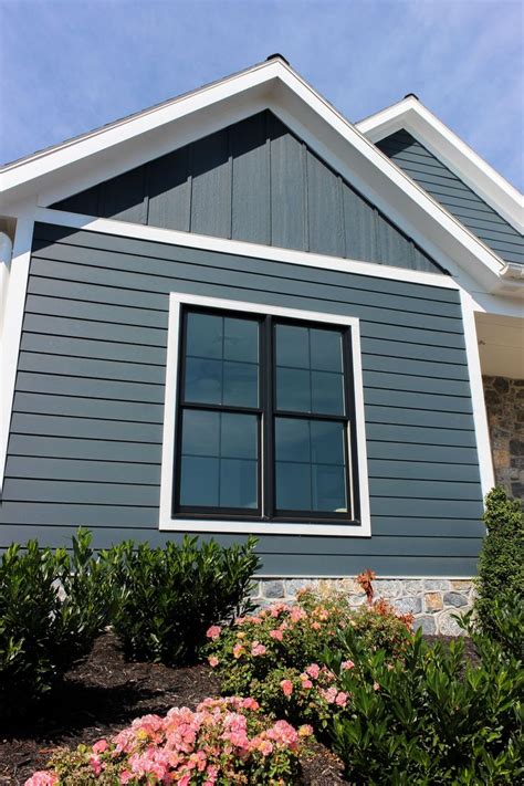 Beautiful Custom Blue Lap Siding With Board And Batten Peak Ranch House Exterior Exterior